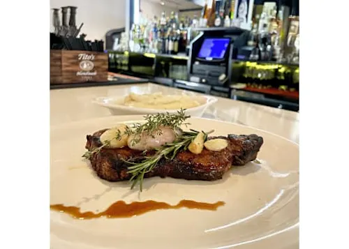 Photo 1 of 4: Zinas Steakhouse & Grill