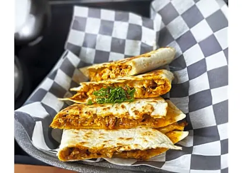 Photo 1 of 4: Taza Grill