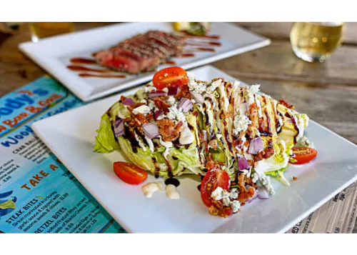 Photo 1 of 4: Woody's Raw Bar & Grill
