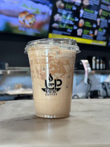 Photo 1 of 4: Uptown Coffee