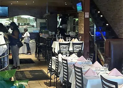Photo 1 of 4: Footprints Cafe - Surf Ave.