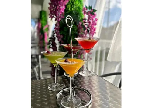 Photo 1 of 4: Coasis Restaurant Bar & Suites