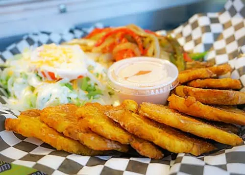 Photo 1 of 4: Dominican Chimi 809