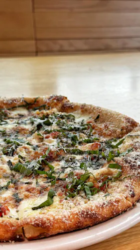 Photo 1 of 4: Pig Ate My Pizza + Nouvelle Brewing