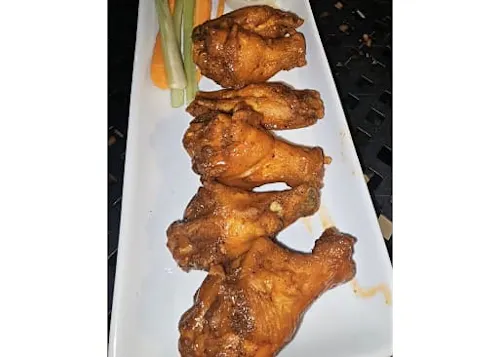 Buck-It Sports Bar & Latin Grill