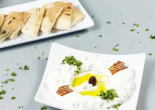 Photo 1 of 4: Sufrat Mediterranean Grill