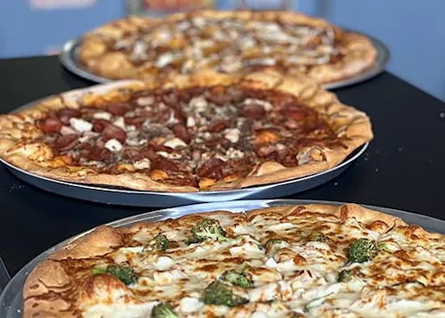 Photo 1 of 4: Mother Clucker's Pizza