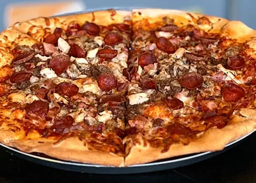 Mother Clucker's Pizza