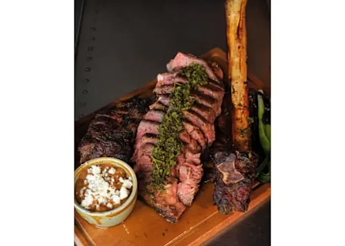 Photo 1 of 4: En Familia Brunch  Steakhouse
